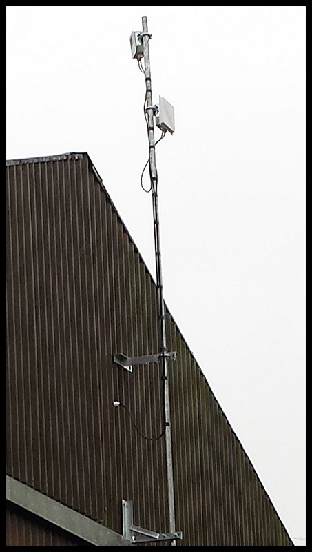 Causeway Security Solutions, We installed a number of 'bullet' cameras with a variable focus lens, a true day/night filter, integrated IR illumination to 50 metres and ingress protection (at IP66) into the calving sheds. From that site, we transmit a 5.8Ghz microwave signal (capable of carrying the video up to 3000 metres - line of sight) to this re-broadcaster, that 'dog legs' the signal around a small wood to a receiver at the farm house.